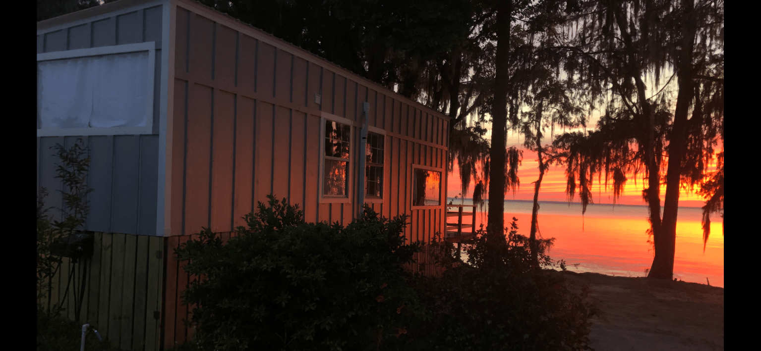 Waterfront tiny house with lake view deck